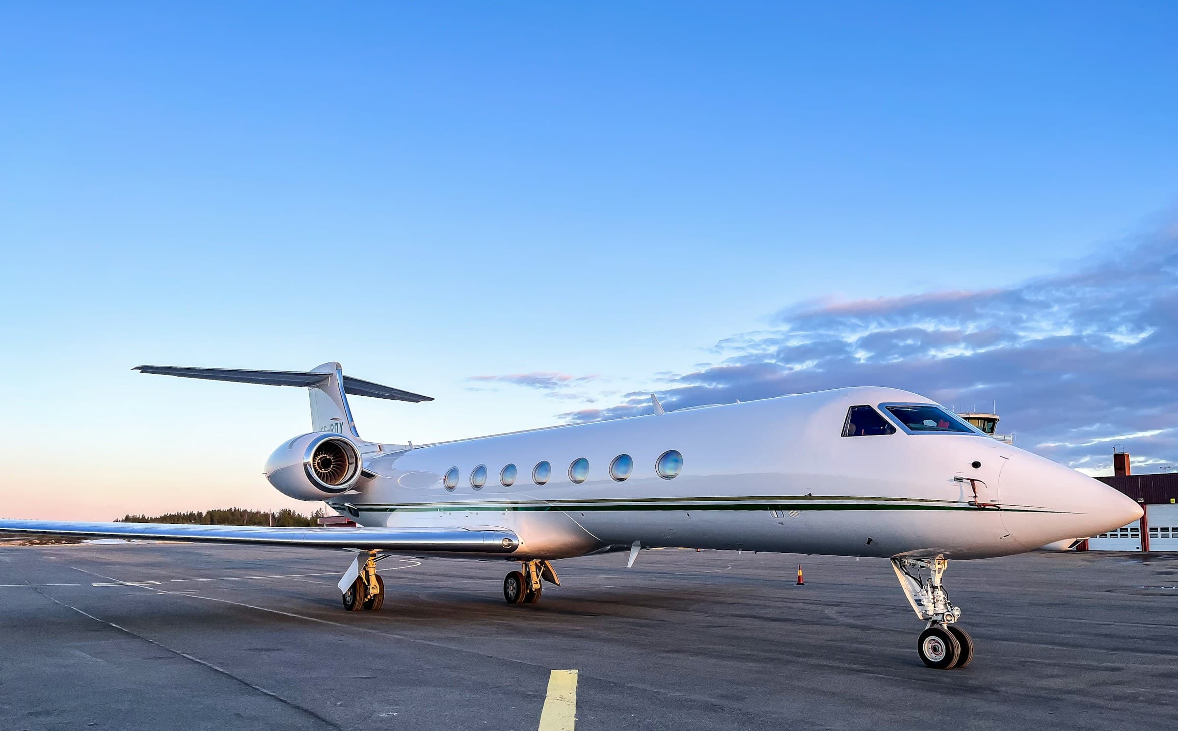 A private jet on the tarmac at an airport